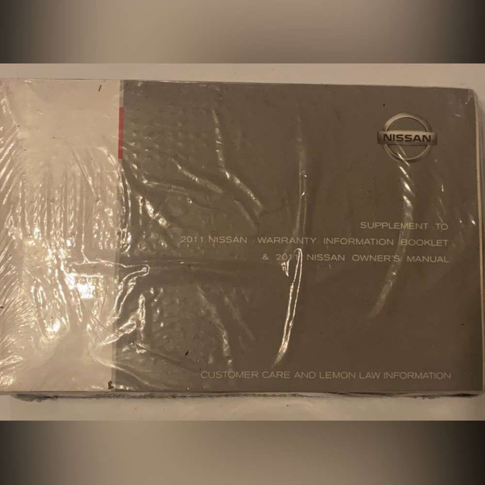 Nissan 2011 warranty booklet and owners manual